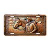 Cowboy holding reins beside a saddled horse illustrated on a 12x6 aluminum license plate, featuring classic western ranch artwork.