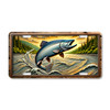 Fishing license plate featuring a Chinook salmon leaping from a river with forested banks and rolling water, printed on aluminum in warm freshwater tones.