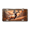 Elk license plate featuring rustic mountain meadow scene with proud elk and pine trees in embossed-look artwork on aluminum.