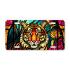 Tiger license plate featuring a colorful stained-glass-style tiger head with floral background on aluminum.