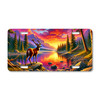 Deer license plate featuring a buck standing by a reflective mountain lake at sunset in vibrant forest colors on aluminum.