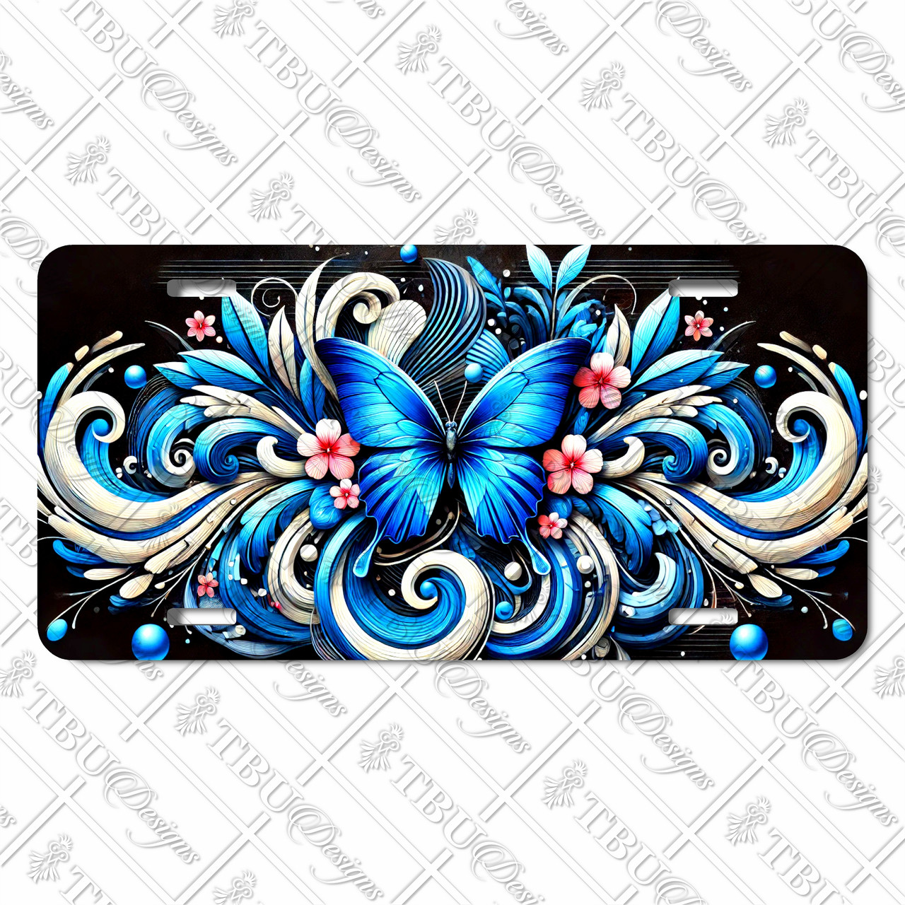 License plate featuring a radiant blue butterfly with swirling floral and wave-like patterns in blue, ivory, and pink on a black background.