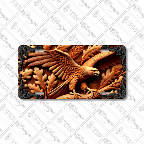 Rustic carved eagle license plate featuring an eagle in flight with oak leaves in a wooden-style embossed-look artwork.