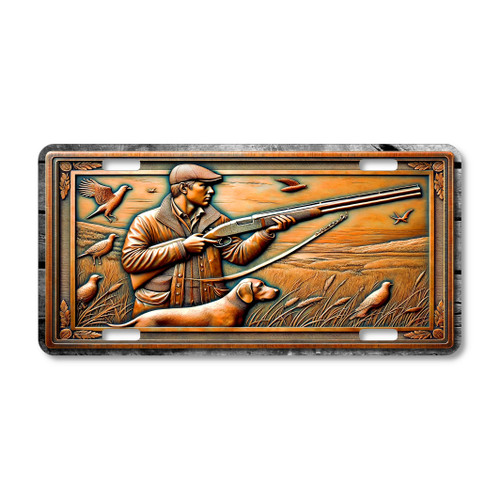 Rustic bird hunting scene license plate featuring hunter with shotgun, retriever dog, and game birds in copper embossed-look design on aluminum plate.