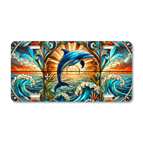 Dolphin license plate featuring stained glass-inspired ocean scene with leaping dolphin, waves, and glowing sunset, printed on aluminum.