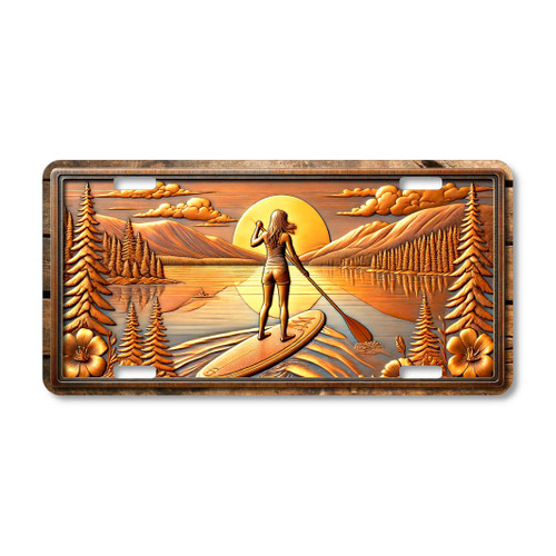 Sunset paddle boarding license plate featuring rustic copper mountain lake scene, glowing tones, aluminum construction.