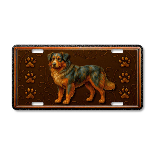 Australian Shepherd license plate featuring embossed-look rustic artwork of the herding dog with paw prints on a textured bronze background.