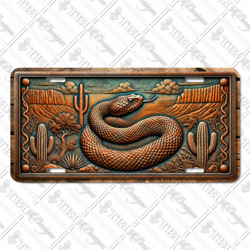 Western rattlesnake license plate featuring coiled snake, desert canyon, and cactus in rustic embossed-look artwork on aluminum.