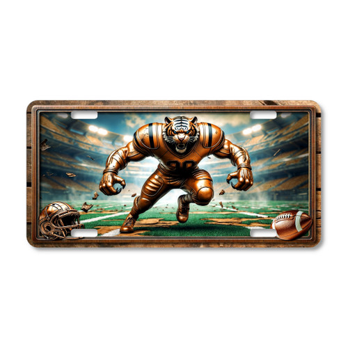 Tiger football mascot license plate featuring a roaring tiger in bronze armor charging forward under stadium lights with cracked turf design, rustic embossed-look artwork on aluminum.