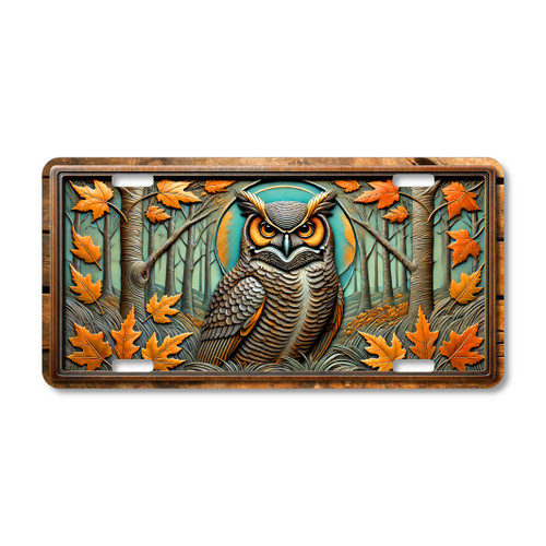 Autumn owl in forest with fall leaves illustrated on a 12x6 aluminum license plate.