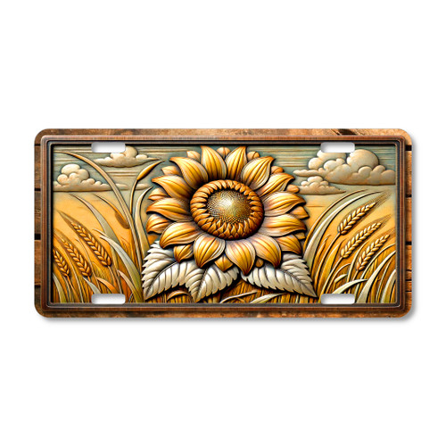 Sunflower standing in a golden wheat field illustrated on an aluminum license plate