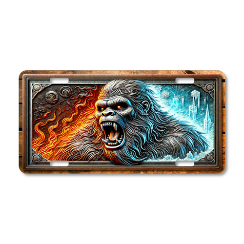 Fire and ice Bigfoot license plate featuring aggressive Sasquatch cryptid artwork with detailed fur textures and glowing eyes printed on aluminum license plate.