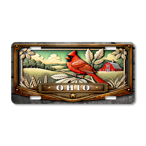 Ohio cardinal license plate featuring red cardinal bird perched over Midwest farmland with wheat, rolling fields, and red barn background on aluminum plate.