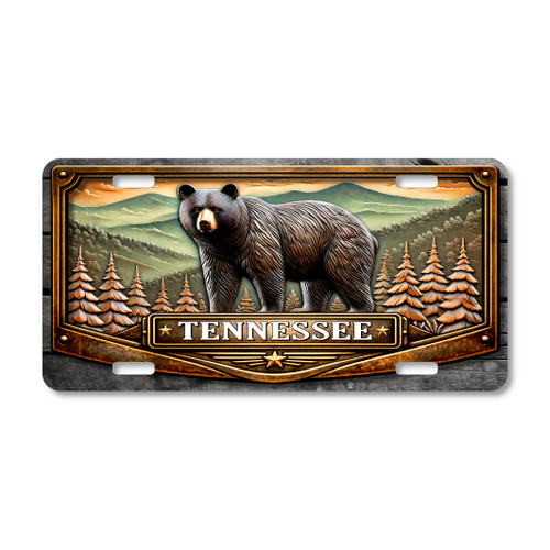 Tennessee black bear license plate featuring bear standing in Smoky Mountain forest landscape with pine trees and mountain ridges.