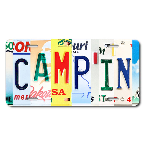 CAMPIN license plate featuring rustic letter collage art design in bold multicolor tones on aluminum.