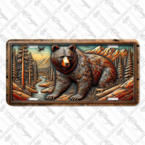 Black Bear license plate featuring rustic mountain forest artwork in bronze and copper tones with river, pine trees, and embossed-look design on aluminum. Black Bear license plate featuring rustic mountain forest artwork in bronze and copper tones with river, pine trees, and embossed-look design on aluminum.