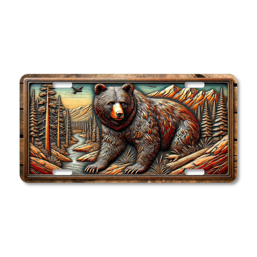 Black Bear license plate featuring rustic mountain forest artwork in bronze and copper tones with river, pine trees, and embossed-look design on aluminum.