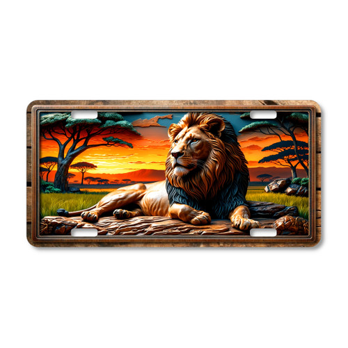 Lion license plate featuring rustic African savanna scene with majestic lion at sunset in embossed-look artwork on aluminum.