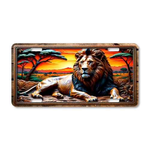 Lion license plate featuring rustic African savanna scene with lion resting at sunset in embossed-look artwork on aluminum.