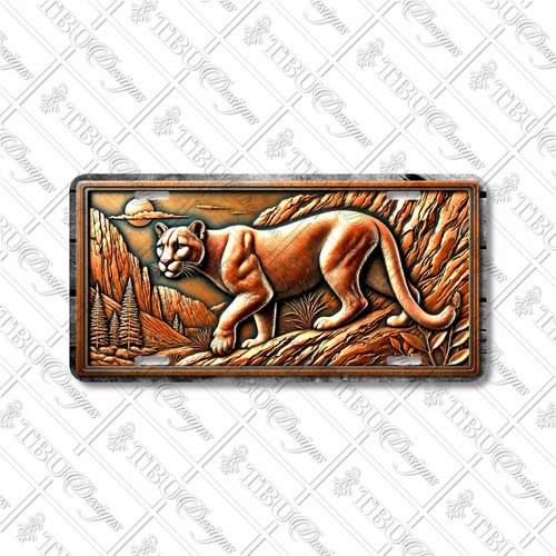 Mountain lion license plate featuring rustic rocky wilderness scene with prowling cougar in embossed-look artwork on aluminum.