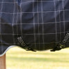 Crossed surcingles on Rhino Pony Wug Turnout blanket, Black/Grey/White Check.