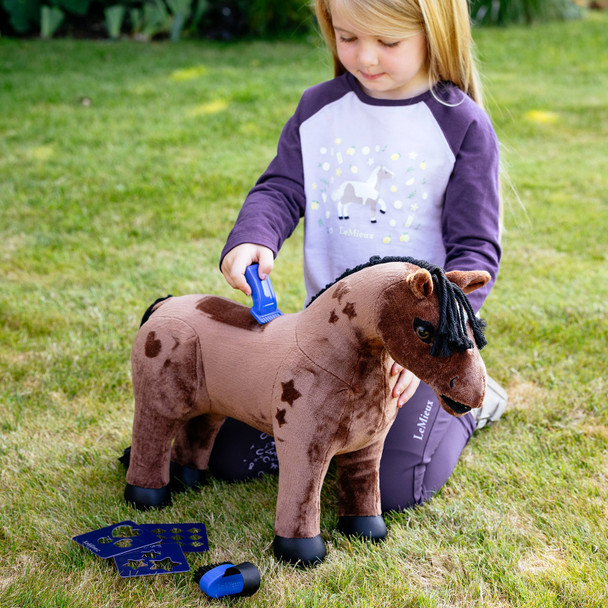 Playing with clippable LeMieux toy pony Gracie.