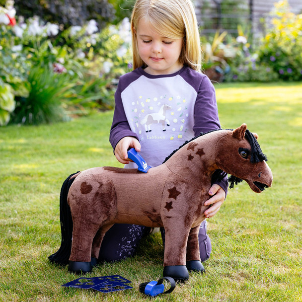 LeMieux Toy Pony Gracie being clipped with stencils.