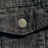 Chest pocket detail on Madcap England Woburn Sherpa Trucker Jacket in Black