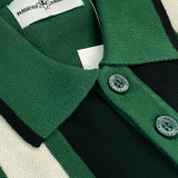Close up on the Madcap England Folklore 60s Mod Stripe Panel Knitted Polo Shirt in Pineneedle 