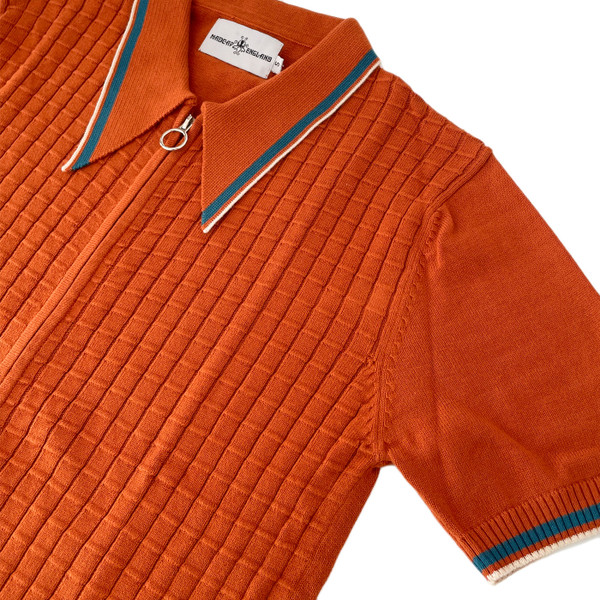 Close up of the sleeve on the Cannon Madcap England Retro Big Collar Zip Through Knitted Shirt in Cinnamon Stick Close up of the sleeve on the Cannon Madcap England Retro Big Collar Zip Through Knitted Shirt in Cinnamon Stick