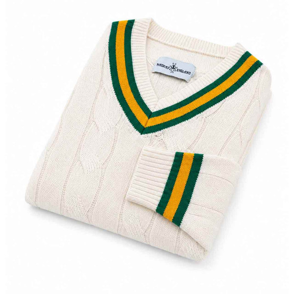 Arthur Men's Retro Tipped V-neck Cable Knit Cricket Jumper in Snow White Folded Up on angle