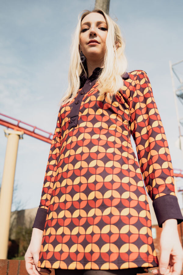 Woman wears Madcap England Daydream 70s Long Sleeve Mod Dress