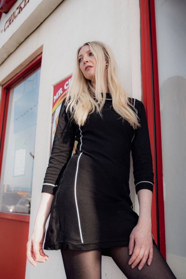 Woman wears Madcap England Knitted Black Mod Dress