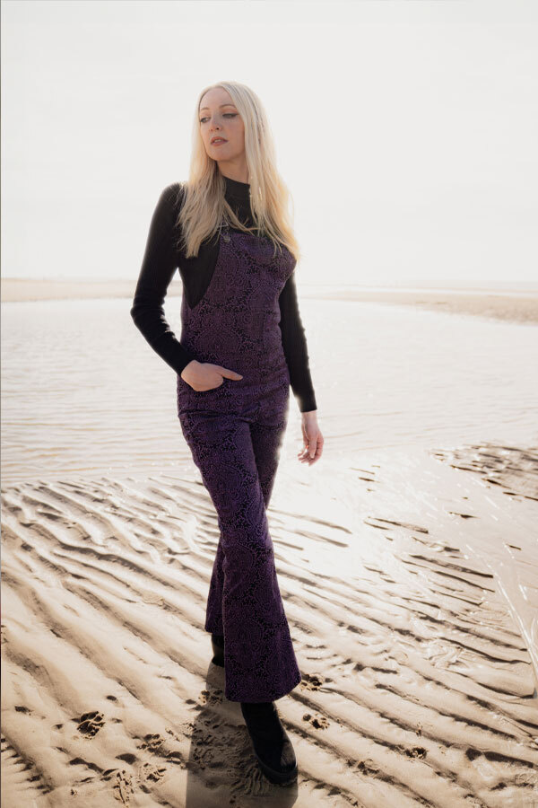 Woman wears Madcap England Paisley Flared Dungarees