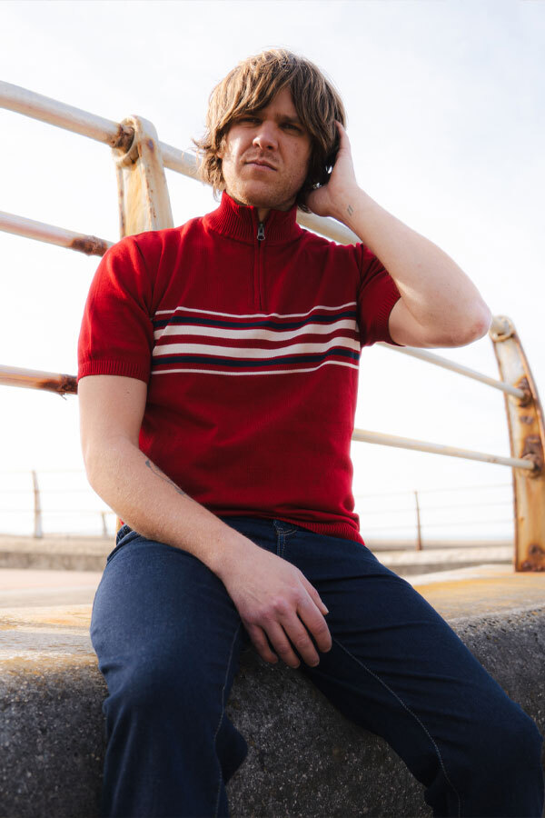 Man wears Madcap England Knebworth Stripe Oasis Cycling Top