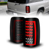 ANZO 00-06 Chevrolet Tahoe / GMC Yukon Full LED Taillights w/ Lightbar Black Housing/Smoke Lens - 311449 Photo - Primary
