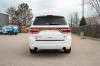 Corsa 11-23 Dodge Durango Xtreme 2.5in Cat-Back Dual Rear Exit w/ Single 4.5in Black PVD Tips - 21186BLK Photo - Mounted