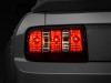 Raxiom 05-09 Ford Mustang Coyote Tail Lights- Blk Housing (Smoked Lens) - 49117 Photo - Primary
