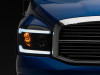 Raxiom 06-09 Dodge RAM 1500/2500/3500 Axial Headlights w/ SEQL LED Bar- Blk Housing (Clear Lens) - R131480 Photo - Close Up