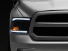 Raxiom 09-18 Dodge RAM 1500/2500/3500 Axial Headlights w/ SEQL LED Bar- Blk Housing (Clear Lens) - R131482 Photo - Close Up