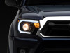 Raxiom 12-15 Toyota Tacoma Axial Series Projector Headlights w/ LED Bar- Blk Housing (Clear Lens) - TT21849 Photo - Primary