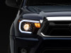 Raxiom 12-15 Toyota Tacoma Axial Projector Headlights w/ SEQL LED Bar- Blk Housing (Clear Lens) - TT21850 Photo - Close Up