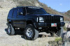 Tuff Country 87-01 Jeep Cherokee 4x4 3.5in Lift Kit EZ-Flex w/Rear Leaf Springs (SX8000 Shocks) - 43803KN Photo - Mounted
