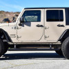 Westin 07-18 Jeep Wrangler JK Unlimited Pro-e Electric Running Boards - 29-23295 Photo - lifestyle view