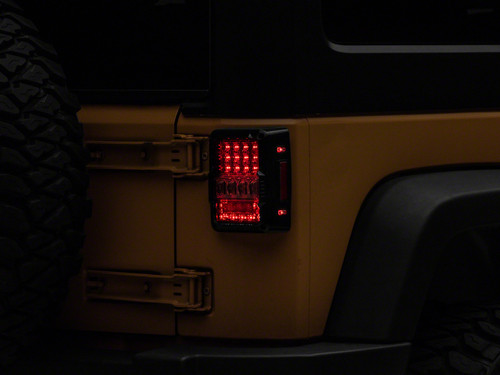 Raxiom 07-18 Jeep Wrangler JK Axial Series Lux LED Tail Lights- Blk Housing (Clear Lens) - J141596 Photo - Primary