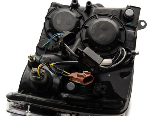 Raxiom 09-18 Dodge RAM 1500/2500/3500 Axial Series Headlights w/ LED Bar- Blk Housing (Clear Lens) - R131481 Photo - Close Up