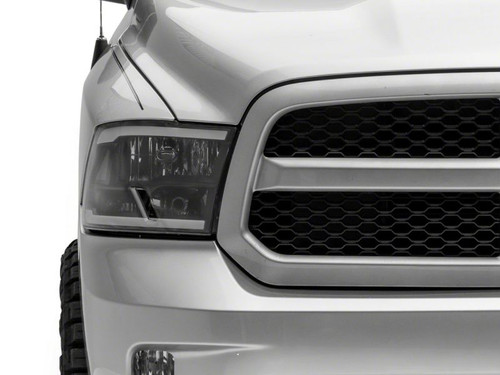 Raxiom 09-18 Dodge RAM 1500/2500/3500 Axial Series Headlights w/ LED Bar- Blk Housing (Clear Lens) - R131481 Photo - Close Up