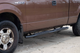 Fishbone Offroad 09-14 Ford F150 Extended Super Cab Oval Side Steps - Black Textured - FB21377 Photo - lifestyle view