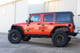 Fishbone Offroad 07-18 Jeep JK 4 Door Wrangler JK Steel Rock Sliders - Blk Textured Powdercoat - FB23009 Photo - lifestyle view