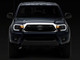 Raxiom 12-15 Toyota Tacoma Axial Series Headlights w/ LED Bar- Blk Housing (Clear Lens) - TT21847 Photo - Close Up